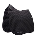 Black quilted saddle pad with a visible brand logo on a white background